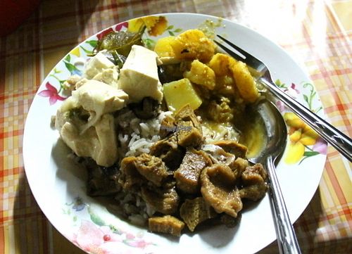 Three sauces on rice. This plus one big taro-filled spring roll with peanut sauce was 50 Baht.  at Thai Vegetarian Food in Chiang Mai