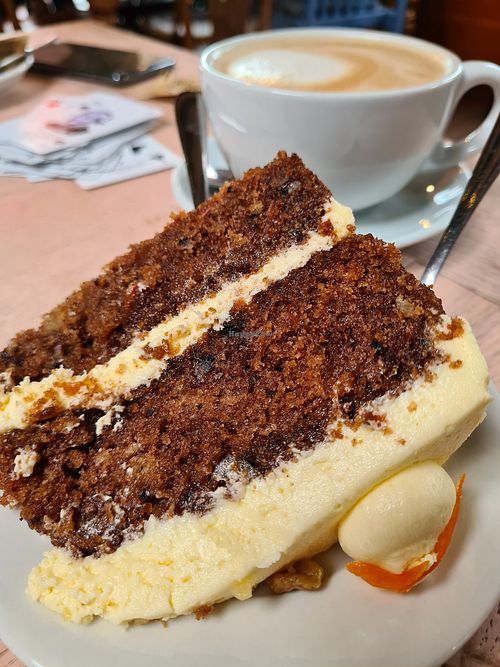 Vegan carrot cake and oat milk latte at Cantina in Paignton