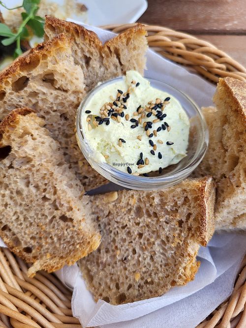 Bread with home made butter with herbs at Atlas Bar in Copenhagen