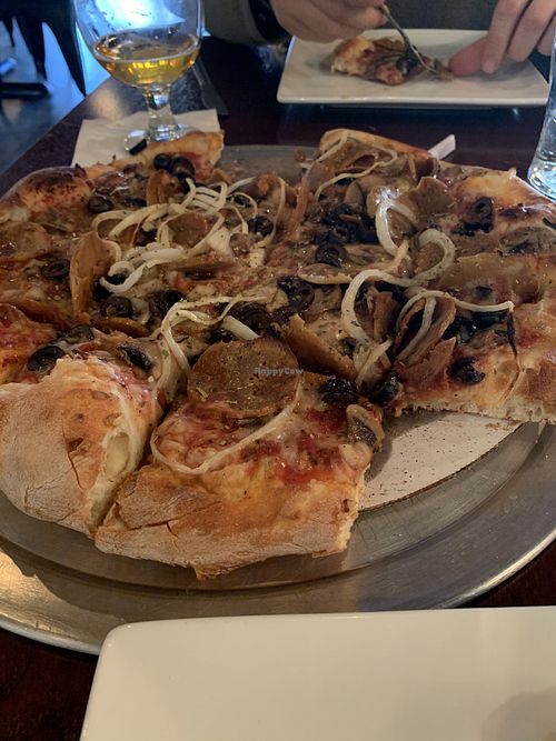 Signature crust pizza at The Chicago House of Za in Chicago