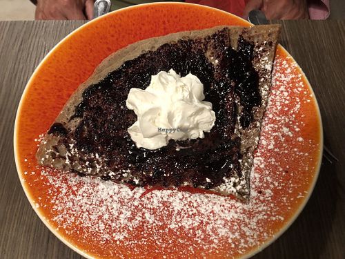 Sweet dessert crepe with vegan whipped cream at La Crêperie des Alpes in Aix-les-bains