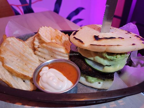 Gluten free soy free burger with fries at Huacamole Vegan Food in San Pedro