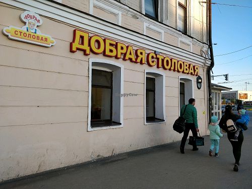 located at the corner of traffic corner  at Dobraya Stolovaya - Bauman St in Kazan