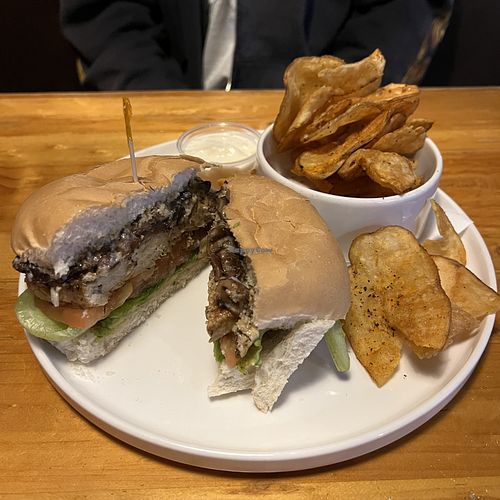 Avocado jerk chicken club with chips  at The Office in St Catharines