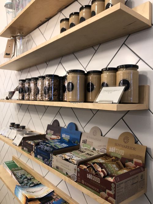 shelf with goodies at Barbarella Juicebar in Ljubljana